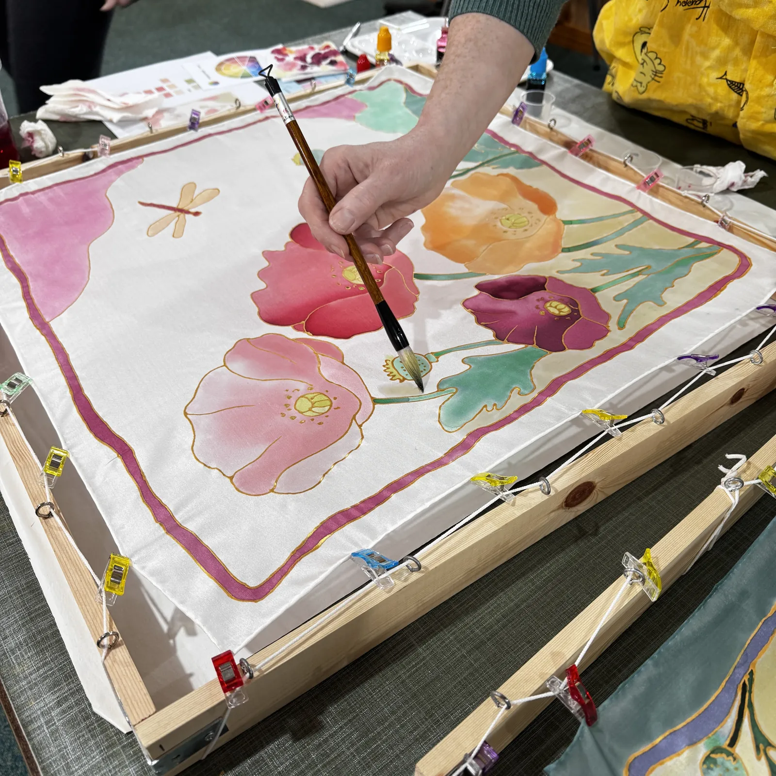 Silk fabric and hand-painted material detail